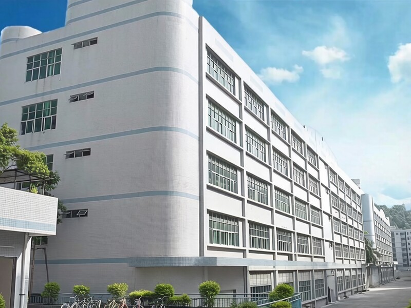 Exterior view of the Forrest factory building under a blue sky.